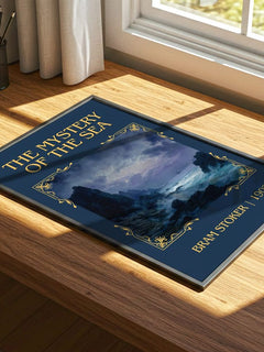 The Mystery Of The Sea Classic Book Art Print by Bram Stoker – print on a sunlit desk