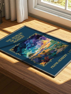 The Worlds Of Frank Herbert Classic Book Art Print by Frank Herbert – print on a sunlit desk