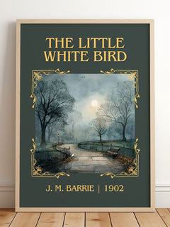 The Little White Bird Classic Book Art Print by J. M. Barrie – framed print leaning on a wooden floor