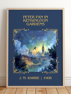 Peter Pan In Kensington Gardens Classic Book Art Print by J. M. Barrie – framed print leaning on a wooden floor