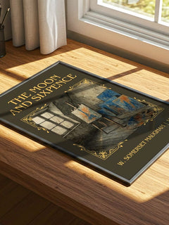 The Moon And Sixpence Classic Book Art Print by W. Somerset Maugham – print on a sunlit desk