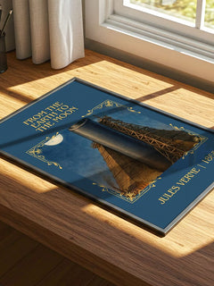 From The Earth To The Moon Classic Book Art Print by Jules Verne – print on a sunlit desk