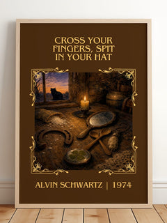 Cross Your Fingers, Spit In Your Hat Classic Book Art Print – framed print leaning on a wooden floor