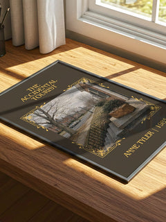 The Accidental Tourist Classic Book Art Print by Anne Tyler – print on a sunlit desk