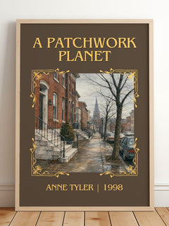 A Patchwork Planet Classic Book Art Print by Anne Tyler – framed print leaning on a wooden floor