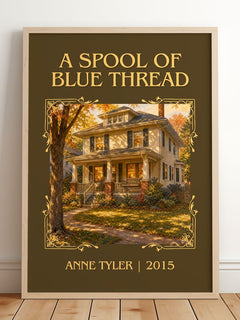 A Spool Of Blue Thread Classic Book Art Print by Anne Tyler – framed print leaning on a wooden floor