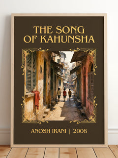 The Song Of Kahunsha Classic Book Art Print by Anosh Irani – framed print leaning on a wooden floor