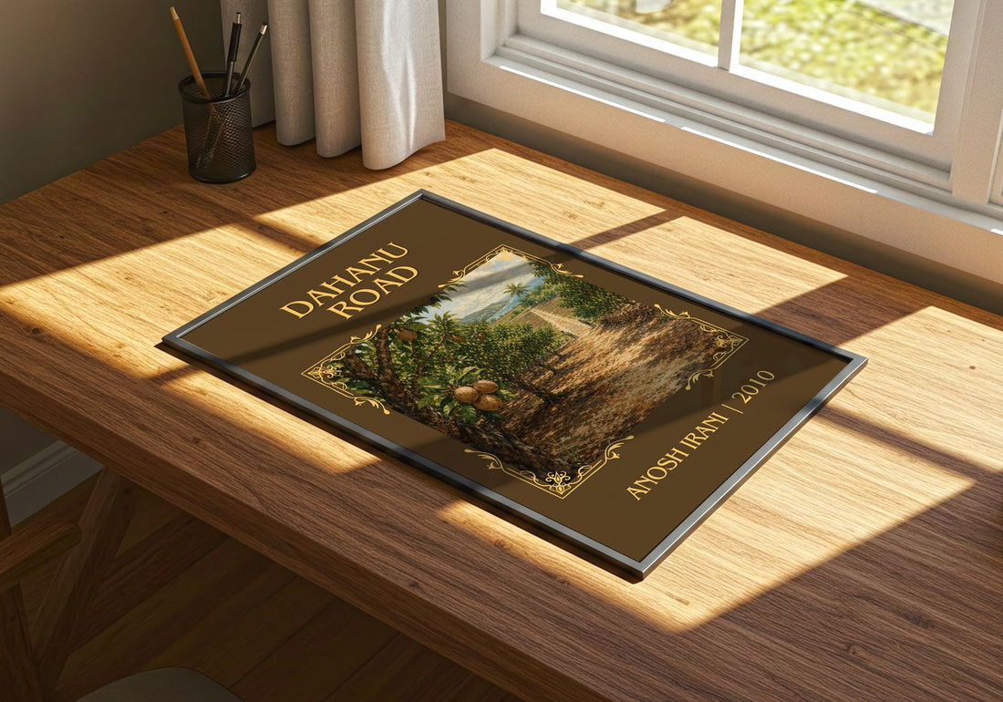 Dahanu Road Classic Book Art Print by Anosh Irani – print on a sunlit desk