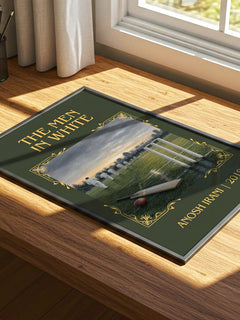 The Men In White Classic Book Art Print by Anosh Irani – print on a sunlit desk