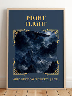 Night Flight Classic Book Art Print by Antoine De Saint-Exupery – framed print leaning on a wooden floor