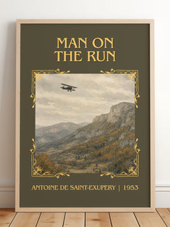 Man On The Run Classic Book Art Print by Antoine De Saint-Exupery – framed print leaning on a wooden floor