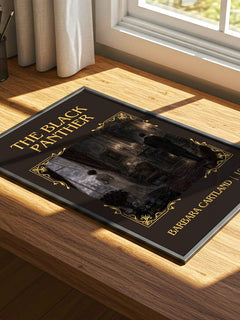 The Black Panther Classic Book Art Print by Barbara Cartland – print on a sunlit desk