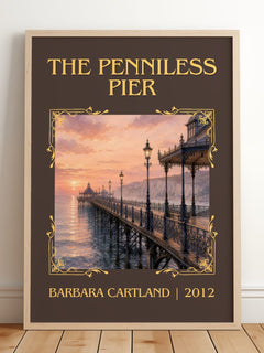 The Penniless Pier Classic Book Art Print by Barbara Cartland – framed print leaning on a wooden floor