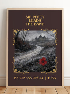 Sir Percy Leads The Band Classic Book Art Print by Baroness Orczy – framed print leaning on a wooden floor