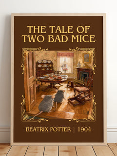 The Tale Of Two Bad Mice Classic Book Art Print by Beatrix Potter – framed print leaning on a wooden floor