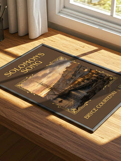 Solomon'S Song Classic Book Art Print by Bryce Courtenay – print on a sunlit desk