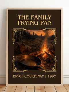 The Family Frying Pan Classic Book Art Print by Bryce Courtenay – framed print leaning on a wooden floor