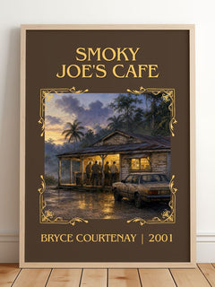 Smoky Joe'S Cafe Classic Book Art Print by Bryce Courtenay – framed print leaning on a wooden floor