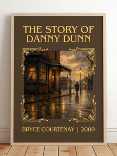 The Story Of Danny Dunn Classic Book Art Print by Bryce Courtenay – framed print leaning on a wooden floor
