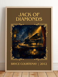 Jack Of Diamonds Classic Book Art Print by Bryce Courtenay – framed print leaning on a wooden floor