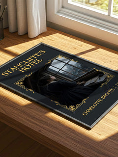Stancliffe'S Hotel Classic Book Art Print by Charlotte Brontë – print on a sunlit desk