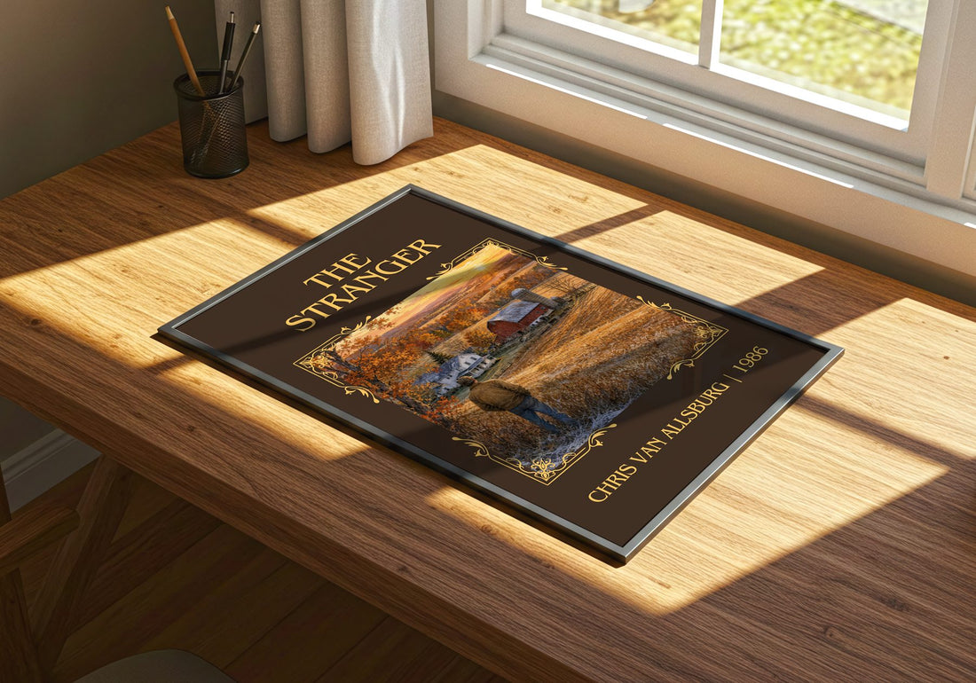The Stranger Classic Book Art Print by Chris Van Allsburg – print on a sunlit desk