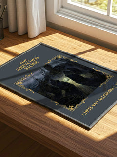 The Wretched Stone Classic Book Art Print by Chris Van Allsburg – print on a sunlit desk