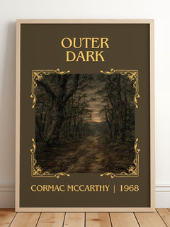 Outer Dark Classic Book Art Print by Cormac Mccarthy – framed print leaning on a wooden floor