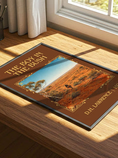 The Boy In The Bush Classic Book Art Print by D.H. Lawrence – print on a sunlit desk