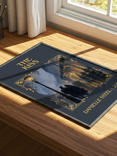 The Kiss Classic Book Art Print by Danielle Steel – print on a sunlit desk