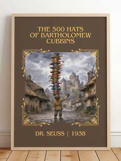 500 Hats Of Bartholomew Cubbins Classic Book Art Print by Dr. Seuss – framed print leaning on a wooden floor