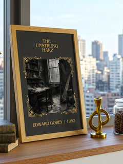 The Unstrung Harp Classic Book Art Print by Edward Gorey – framed print on a city-view windowsill