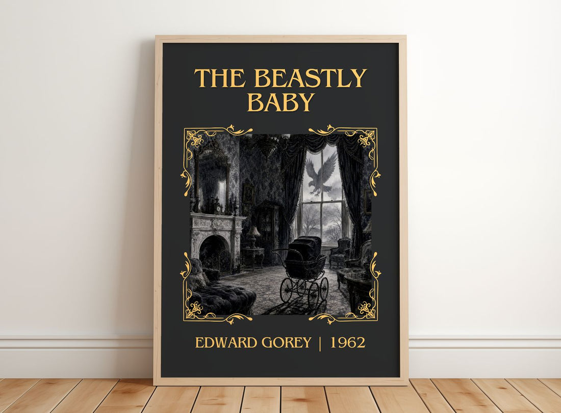 The Beastly Baby Classic Book Art Print by Edward Gorey – framed print leaning on a wooden floor