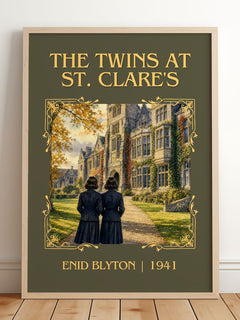 The Twins At St. Clare'S Classic Book Art Print by Enid Blyton – framed print leaning on a wooden floor