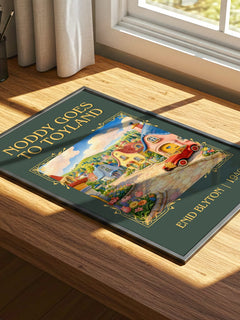 Noddy Goes To Toyland Classic Book Art Print by Enid Blyton – print on a sunlit desk