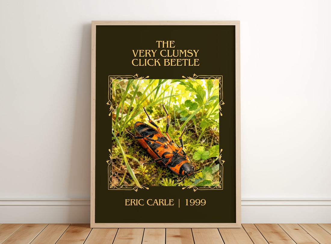 The Very Clumsy Click Beetle Classic Book Art Print by Eric Carle – framed print leaning on a wooden floor