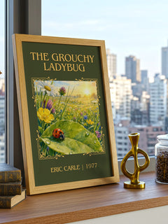 The Grouchy Ladybug Classic Book Art Print by Eric Carle – framed print on a city-view windowsill