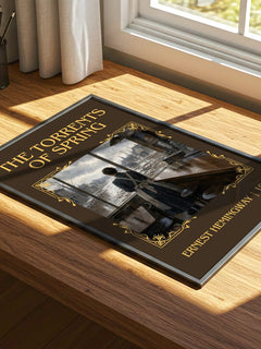 The Torrents Of Spring Classic Book Art Print by Ernest Hemingway – print on a sunlit desk