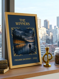 The Winners Classic Book Art Print by Fredrik Backman – framed print on a city-view windowsill
