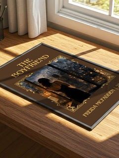 The Boyfriend Classic Book Art Print by Freida Mcfadden – print on a sunlit desk