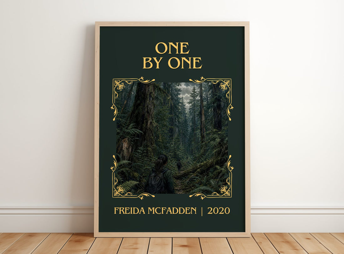 One By One Classic Book Art Print by Freida Mcfadden – framed print leaning on a wooden floor