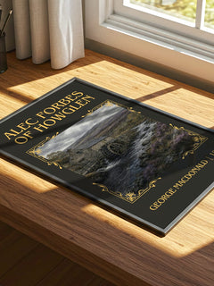 Alec Forbes Of Howglen Classic Book Art Print by George Macdonald – print on a sunlit desk