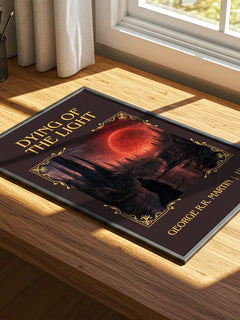 Dying Of The Light Classic Book Art Print by George R.R. Martin – print on a sunlit desk