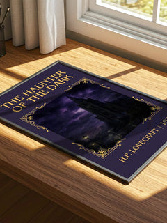 The Haunter Of The Dark Classic Book Art Print by H.P. Lovecraft – print on a sunlit desk