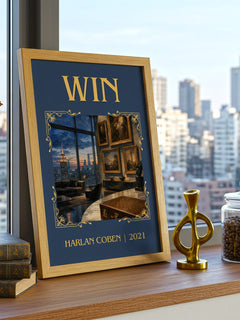 Win Classic Book Art Print by Harlan Coben – framed print on a city-view windowsill