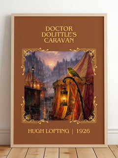 Doctor Dolittle's Caravan Classic Book Art Print by Hugh Lofting – framed print leaning on a wooden floor