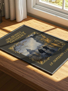 The Beastly Beatitudes Of Balthazar B Classic Book Art Print by J.P. Donleavy – print on a sunlit desk