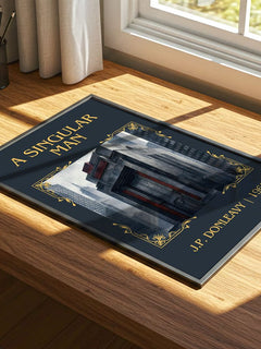 A Singular Man Classic Book Art Print by J.P. Donleavy – print on a sunlit desk