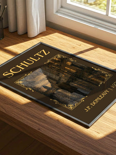 Schultz Classic Book Art Print by J.P. Donleavy – print on a sunlit desk