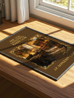 Are You Listening Rabbi Löw Classic Book Art Print by J.P. Donleavy – print on a sunlit desk